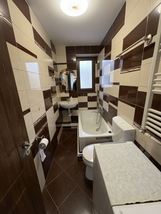 Apartament modern de închiriat – poziționare centrală